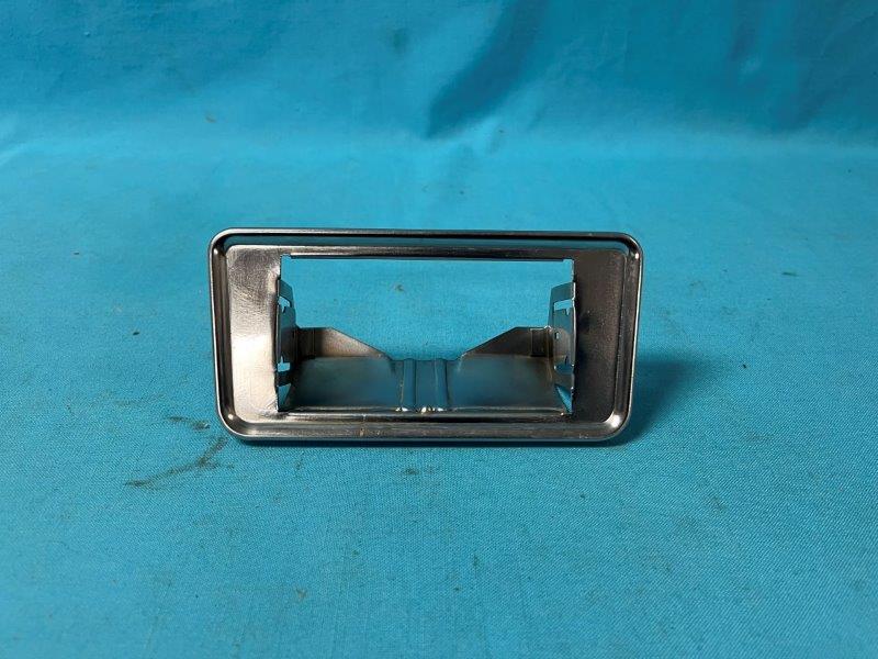 Front seat ashtray housing - found on the backside of the front bucket seat backrest.