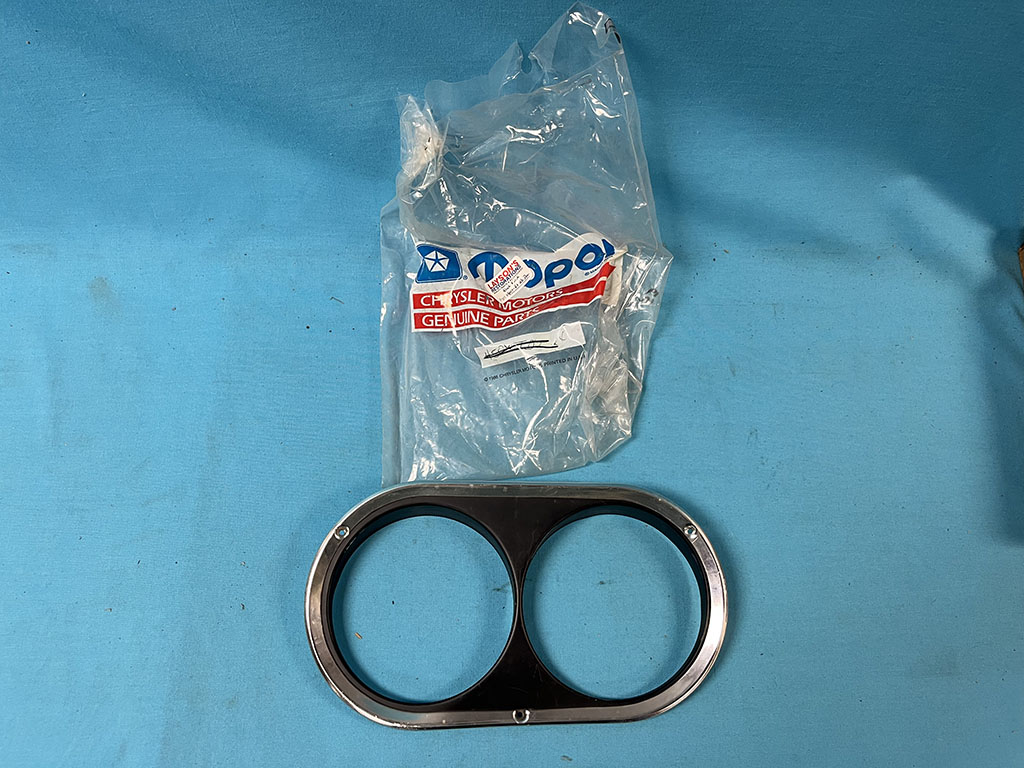 Headlight Bezel - Passenger side