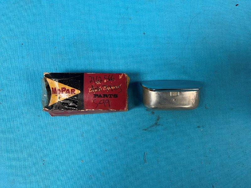 Front seat - backrest ashtray.  Fits on the backside of the front seat backrest. Stainless and with its original box.