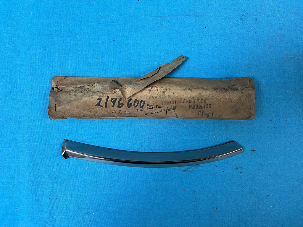 SOLD - Passenger side Door lower rear molding