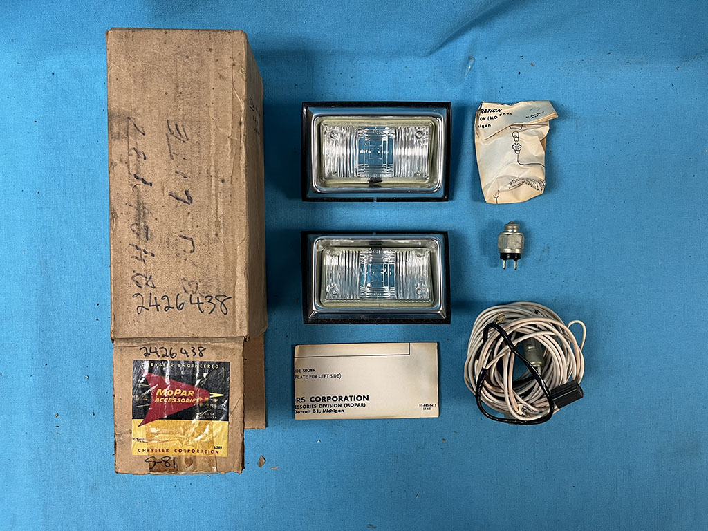 Backup Light Package - for 4 speed transmission vehicles.  This is very rare accessory package where we have perfect backup housings and lenses to go with the entire accessory harness, backup light switch and Chrysler instructions.