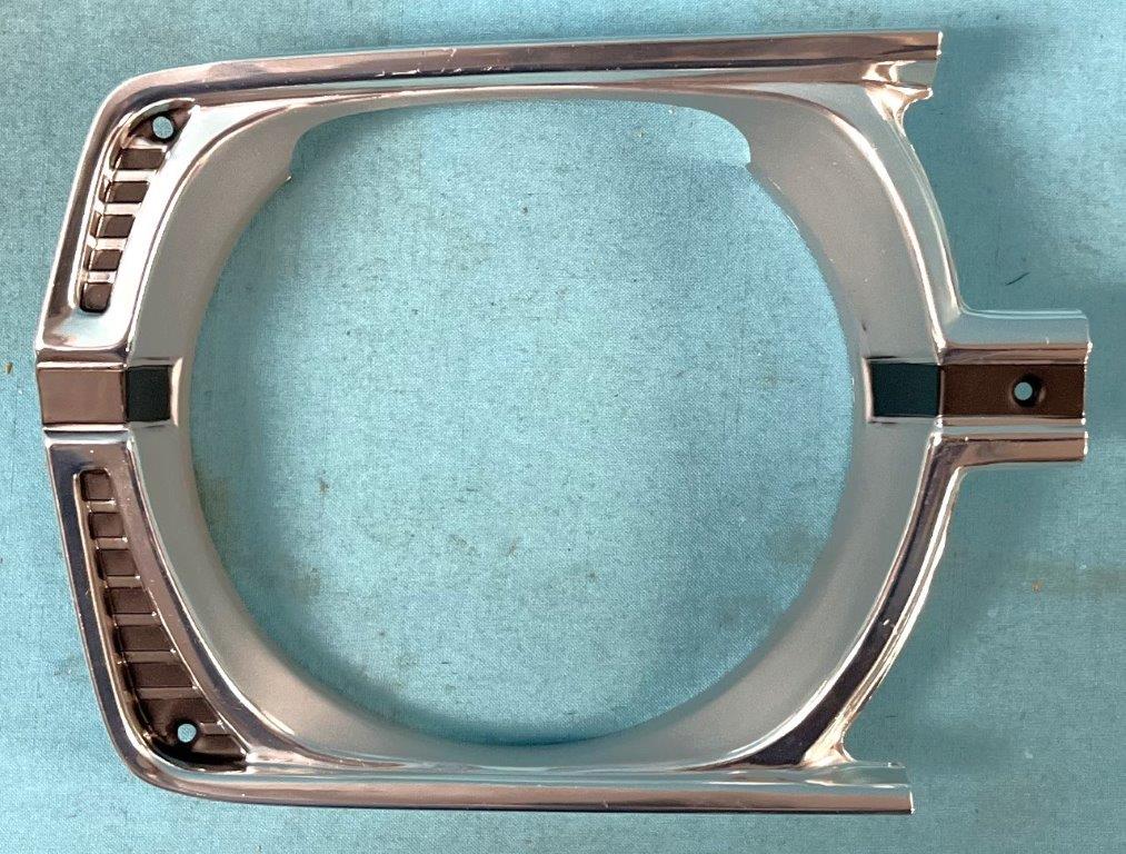 Headlight Bezel or Door - Passenger side