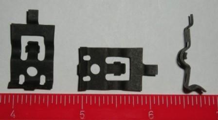 Heater Box Cable clip.  This clip used on all underdash cables that attach to the heater box.  Special clip that has the shape of the cable so it can snap around the cable to hold it in place.  Exact reproduction replacement.