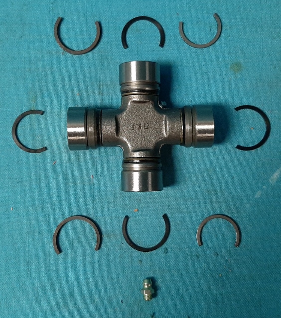 UJoint Combination / conversion.  When converting to a new 8-3/4 third member (741/742 or 489 case) that has a different size yoke - this combo kit allow you to keep the rear driveline intact and use this u-joint conversion instead.