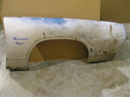1968 Barrcuda Passenger fender- White.  This fender has damage towards the front nose - prior body shop as drilled holes in side panel to pull out dent.  West Coast fender.