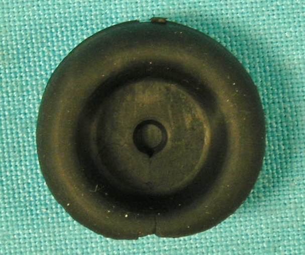 License Light Wire Grommet - 2nd option (see picture) to part #LA-DL1.  See what your vehicle came with.