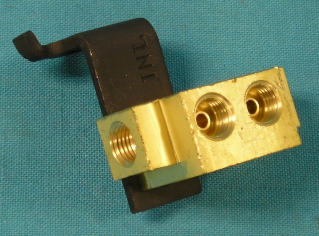 Distribution Tee block.  Brass 5 port valve front drum - rear drum Dual master cylinder conversion.  For using when converting vehicle to dual master cylinder or disc. brakes.