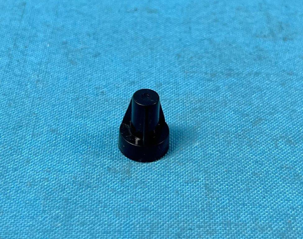 Upper headlamp splash shield screw cap.  These caps (2 needed per car) cover the screw that is sticking out most likely so you don't cut yourself when you get near that screw located just inside radiator support panel at the inner fender (both sides).