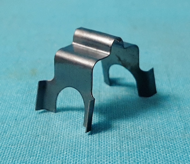 Spring Clip - Holds the shoes in place at the end of the steering shaft.
