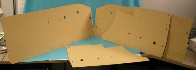 Door panel backing boards (full set of 4) for 2dr Hardtop.  These are for GT models that have the chrome metal band at the bottom of the panels that separate the carpet section from the vinyl section on the door panel.  All holes are pre-drilled for easy installation and for replacement of the old vinyl onto these new backing boards.  Also great for custom upholstery work.