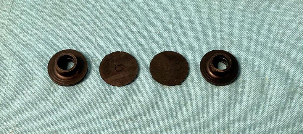 Vent window pivot seals (pair) / Also quarter glass pop-out glass  - black seals that go through the round hole in glass for the chrome pivot. (one set for each glass) - this is (2) such sets - for (2) pieces of glass