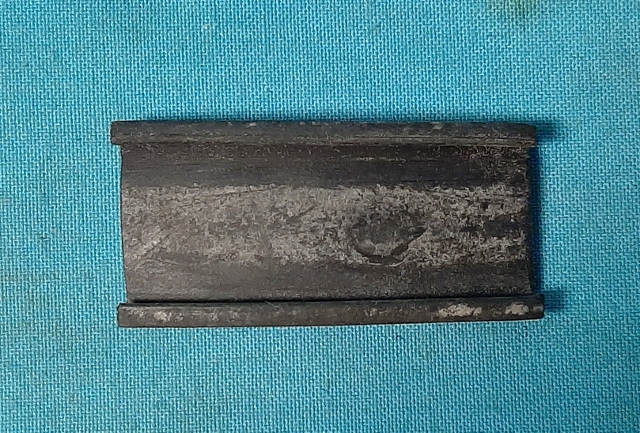 Leaf spring clamp / strap rubber - fits between spring and metal strap. (each).  2-1/2" long by 1-1/4" wide.