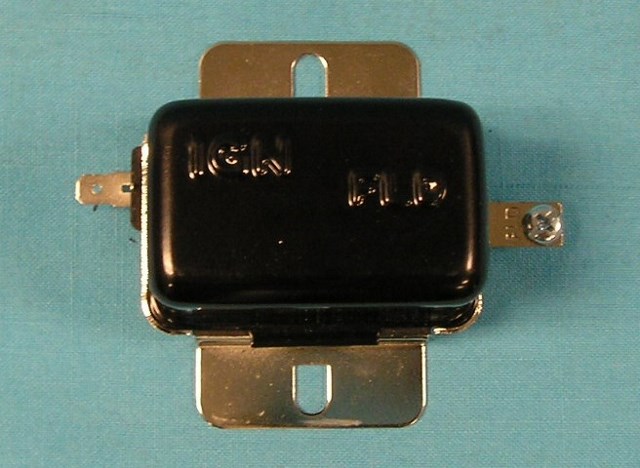 Voltage regulator -  OE Style with black case.  Electronic Ignition.  This OEM Points box has been converted for electronic ignition converted vehicles so you can run the factory looking original voltage regulator with the black box and yet have it for the electronic ignition system your vehicle has been converted to from points.