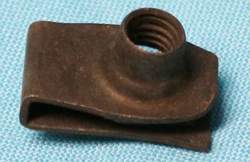 Extruded "U" nut - 5/16" - 18 screw panel range .060" - .090". Center of hole to edge 9/16"