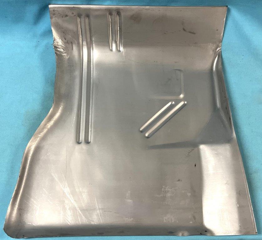 Front Passenger Side Floor Pan.  Made to original gauge thickness with reinforcement ridges in the floor for strength.  The top of the panel buts up against the body seam on the firewall and the back of the panel ends to where it would start to go under the front seat.  Measures 25" in length by 22" in width.  Made in the USA