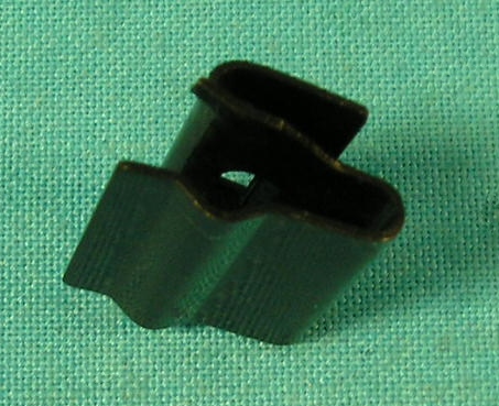 Rear Belt Trim Retainers - These "retainers" allow the screw studs to hold into the car after going through the sheetmetal of the car and are shaped like an "S".  (Each)