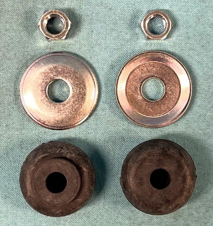 Shock bushing kit. (2) bushings and (2) washers (2) nuts.