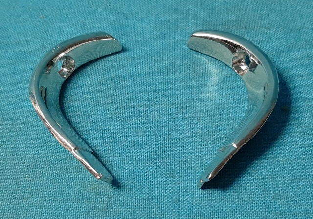 Lower Drip Rail Mldgs (pair) - For GT and GTS 2dr hardtops only.  Original part # 2839 795 / 794.  These are located where the drip rail mldg ends at the very back and bottom of the drip rail.  The chromed metal pieces have a sharp curve to them and transition into the side belt mouldings on the vehicle.  No longer pot-metal - these reproductions are a high quality non pitting reproduction.