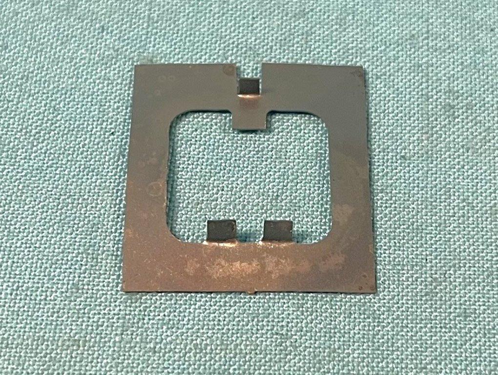 Mirror Retainer Clip - Remote side view mirror.  Made from spring steel and heat treated like originals.  Prevents mirror cable from twisting while tightening mounting nut.