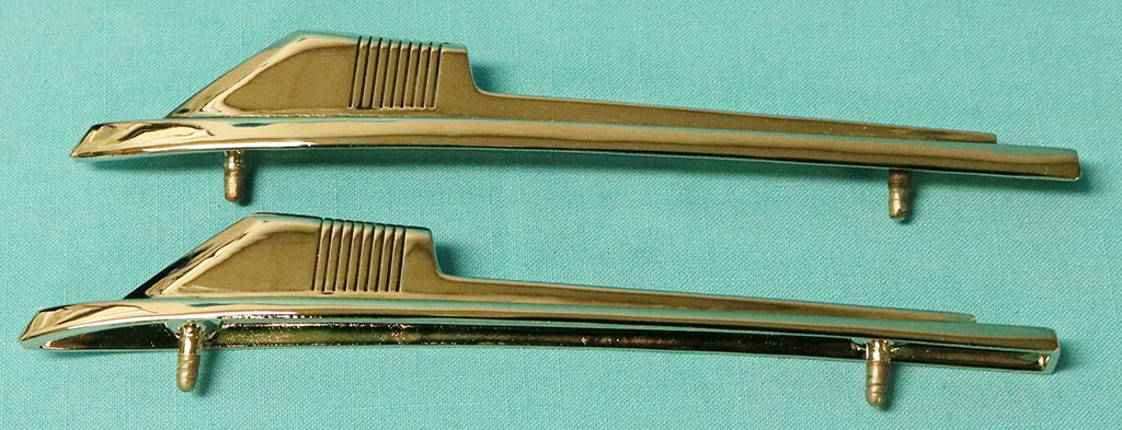 Top Front Fender Medallion / Moulding.  Originally pot-metal - this reproduction is of a two part alloy based metal that won't pit that is chromed.  8.5" long.  Original part # 2524 943/ 942 (pair)