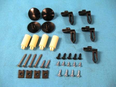 Grill mounting hardware kit.  Part of what comes with kit (4) plastic headlight retainers, (5) plastic push pins, (5) lower grill "wedges" at bottom of grill....