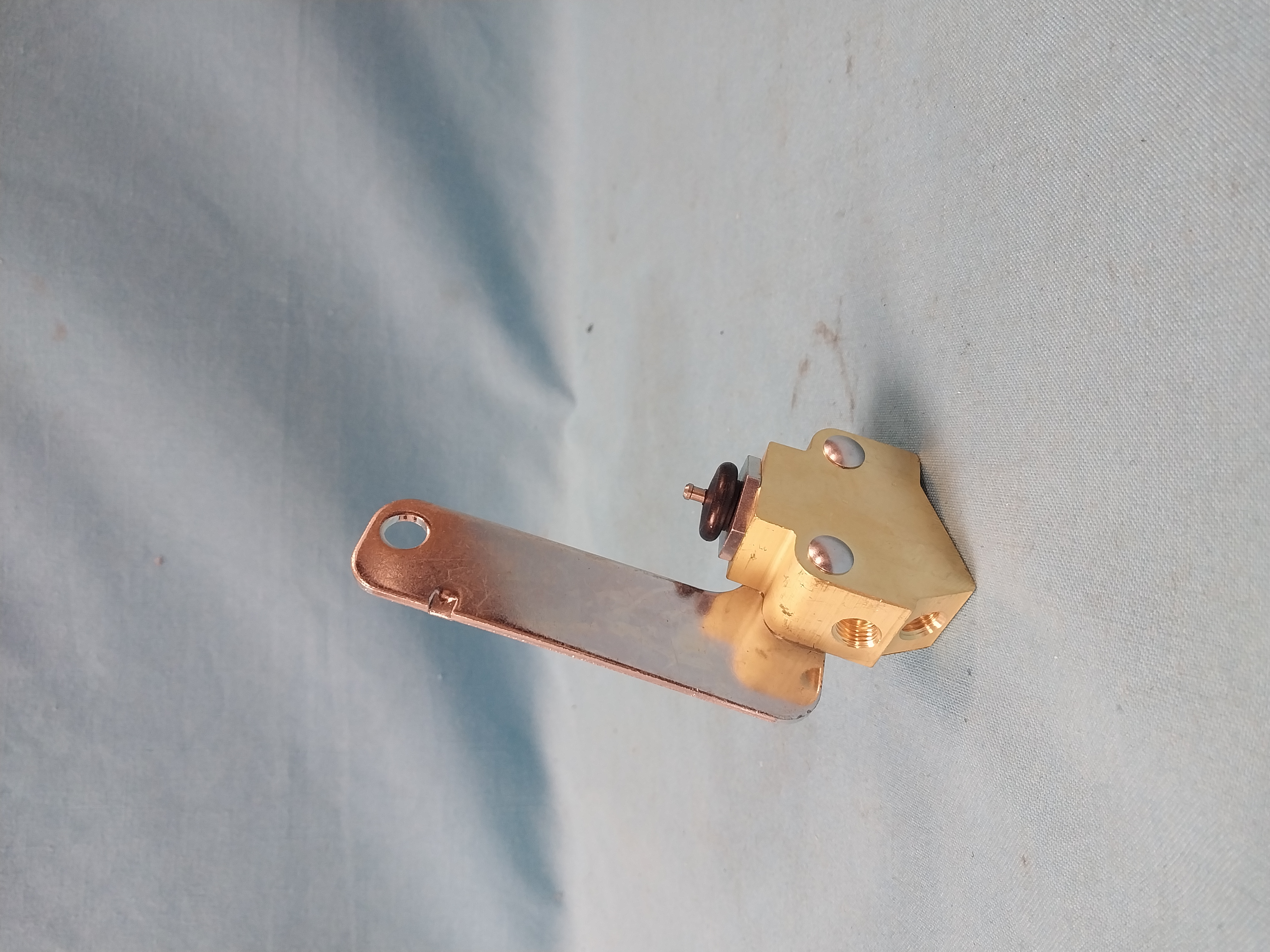 Distribution Block - Brass 3 port valve Disc. or Drum brakes.  2nd part that is needed if Disc. brakes.  Used in junction with the distribution block # 329-44980.  For use on 1970 B-body Mopar with disc brakes. If your Mopar had factory disc brakes you had the texas valve that was used in junction with the distribution block. The second valve with the silver bracket was used in junction with the distribution block on factory disc brake cars. 

This is the distribution block that is mounted below the master cylinder which feeds fluid to all four wheels