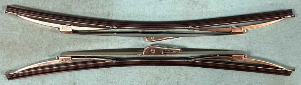 Wiper Blade - Similar to originals - 16".  Has Aero Blade (wing) in polished stainless steel. (Pair).  These do Fit on the glass and sweeping motion does not interfere with windshield seal.  Improvement in a more clear window from a 13" or 14" blade.  Will attach to USED wiper arms or our NEW REPRODUCTION Polished stainless wiper arms # 319-46242