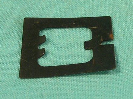 Remote side view mirror retaining clip