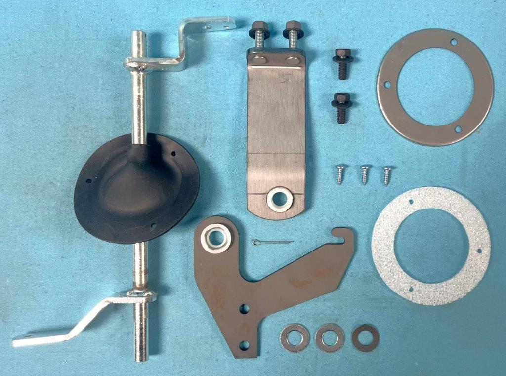 Gearshift Control Assembly.  Includes gearshift control torque shaft, upper support bracket & Bushing, lower support bracket & bushing, gearshift control lever, the torque shaft boot with open cell gasket & formed mounting flange and hardware