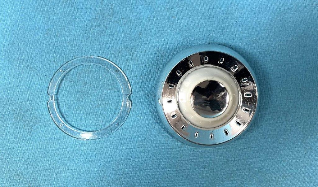 Round Interior C-Pillar Dome Light lens and finish plate.  Reproduction of Chryslers part # 2499 319.  SOld (each)...fits either side - 2 per car.  A-body Plymouth Signet models and Dodge Dart GT models.  B-body Plymouth Sport Fury & Dodge Polara 500. C-body Newports, New Yorkers, Imperials.   Chrysler 300