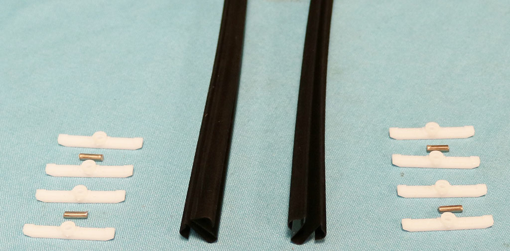 Glass Channel Weatherstripping (with clips and pins included) - front leading edge of the door glass seals (pair) - one per glass...reproductions.  Installation instructions and pictures are available upon request and purchase of this part.  For additional extra hardware or wanting hardware only - see hardware kit part # 371-52984