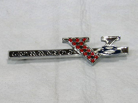 "Commando V8" - Repro of the large nameplate with the black painted letters, and the red and chrome checkered flag Dark Blue within the large "8".