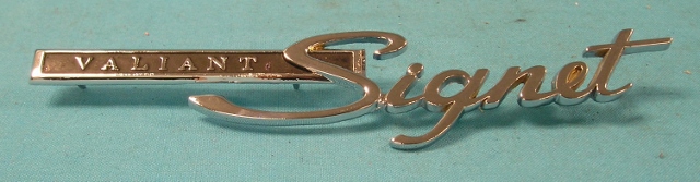 Fender Emblem - "Signet 200".  Also found for 1965 Canadian Valiants.
