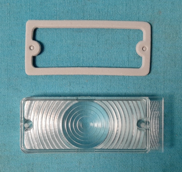 Back-up light lens (left or right). each (discount exempt)