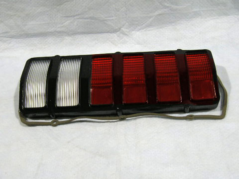 Passenger side Tail Light Lens.  Notify at time of order if flat black or gloss black version on lens.  Flat black was for vehicles with the flat black tailpanel stripe.