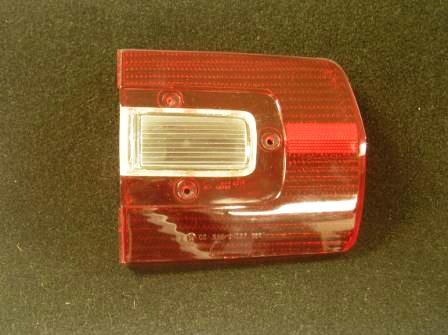 Passenger Side Tail Light Lens - one bigger blemish on one side of lens with a few minor scratches.