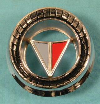 Signet Grill medallion (round)- Original parts #2578 572. Chrome is warped, not even all the way around, some minor scratches in chrome as well