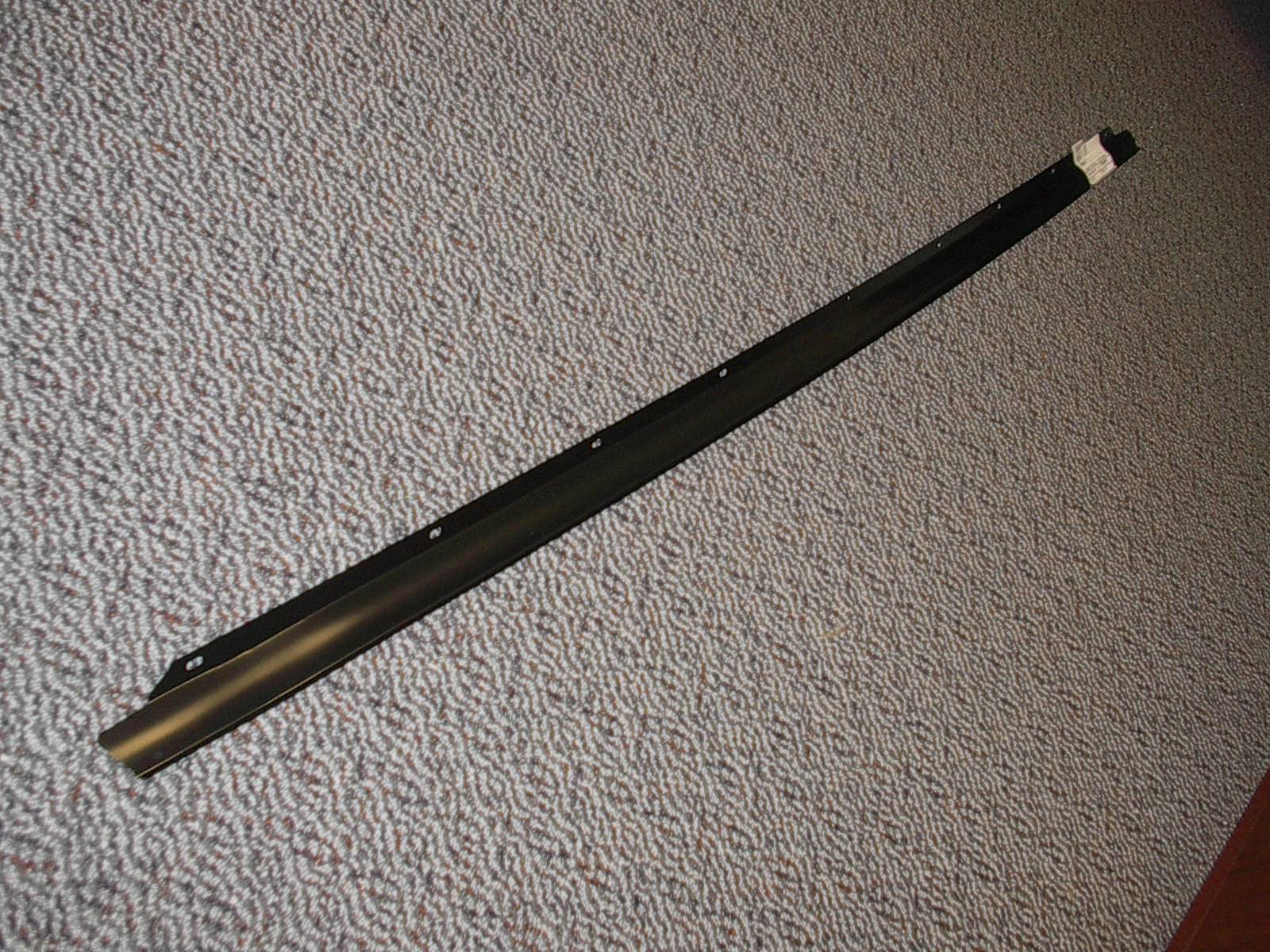 Bumper Filler - Rear.  this is the metal filler panel - not rubber.