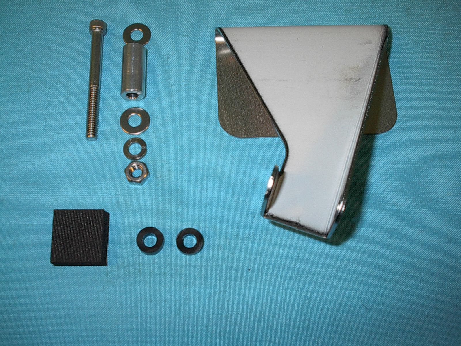 discontinued - Half dash pad tach bracket.  Please note:  The tach fits only the following apps. Auto Meter Monster tach & Auto Meter Sportsman (with spacers).