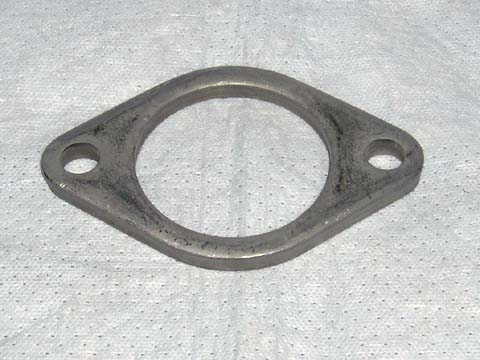 Exhaust Flanges 2 1/2" i.d. Flanges for Heavy Duty Style. each 2 hole.  Excellent reproduction of the 2 1/2” exhaust manifold flange gasket used on 1967-74 high performance engines.  Stamped from correct temper steel with all of the details of an original part.  Black oxide & oil seal finished as original.  Don’t settle for those nasty fiber gaskets that fail and leak.  Chrysler engineers knew best!  Reference Chrysler part number 2856 029 - Sold (each)