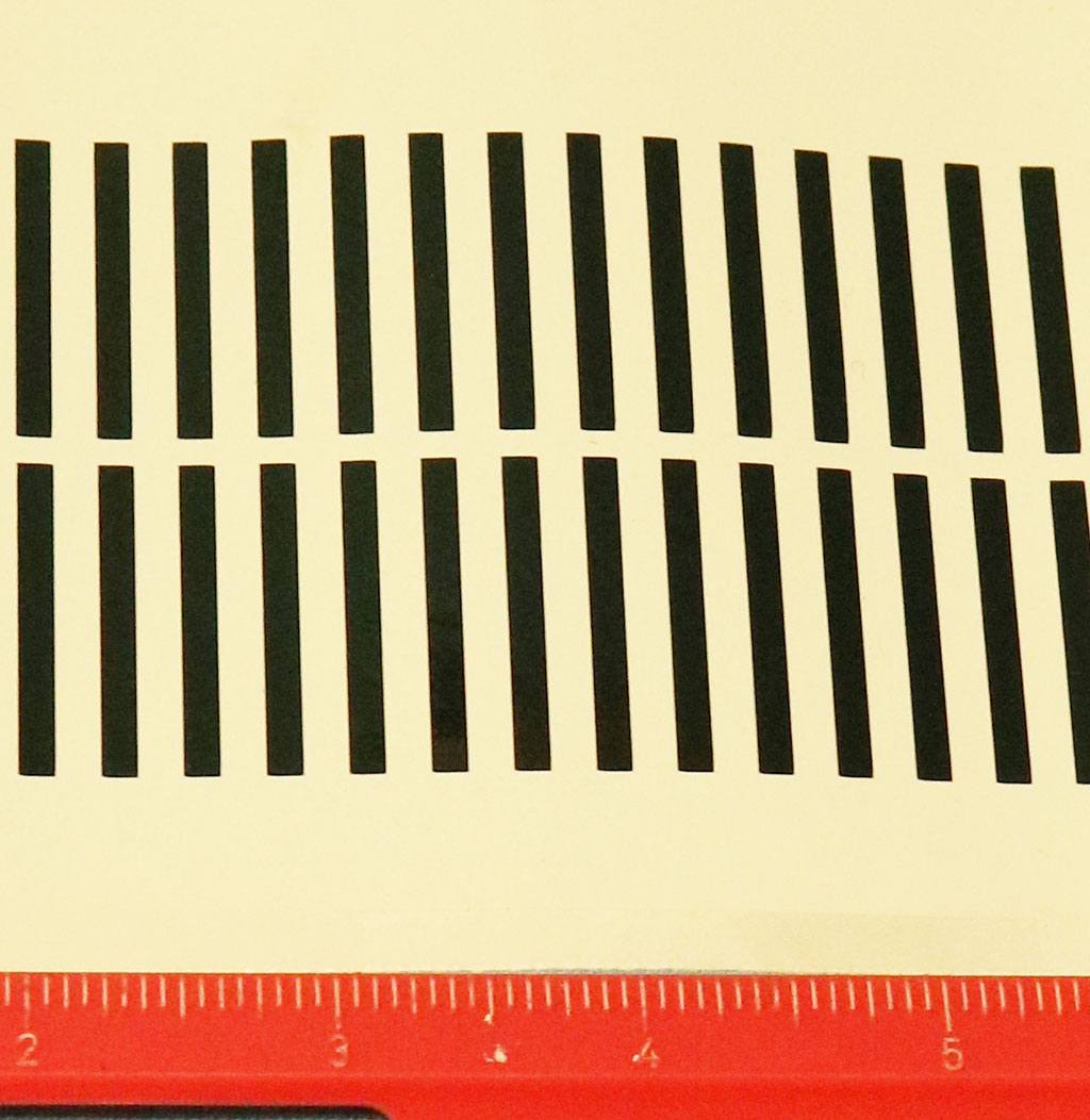 Rear Panel mldg black “decal” black stripes.  High Quality adhesive stripes for application to mldg.  Signet Models only - for application to panel mldg between the tailights. (146 stripes needed - 150 supplied)