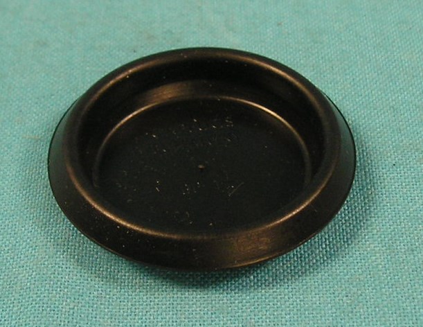 Recess sheet metal plug in black plastic 1-1/2"