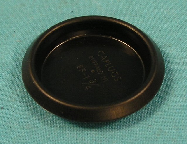 Recess sheet metal plug in black plastic 1-3/4"