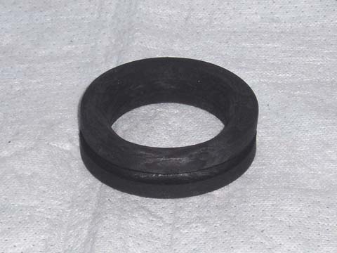 Filler Neck to Tank Grommet. Reproduction.  2" inside diameter.  2-7/8" outside diameter.  7/8" thick.  For up to all 1974 A-body but also for 75-76 Duster / Dart Sports).