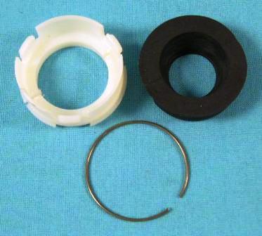 White lower steering column retainer, seal and with spring.  can be installed without removing the steering shaft