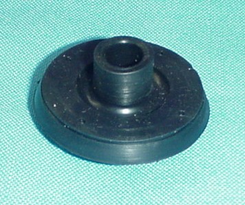 Emergency Brake Cable Grommet on Firewall. This is the grommet that fits in the firewall where the parking brake cable brake passes through.  A torn grommet will allow the cables to rub against exposed sheetmetal edges.  This grommet fits all models.