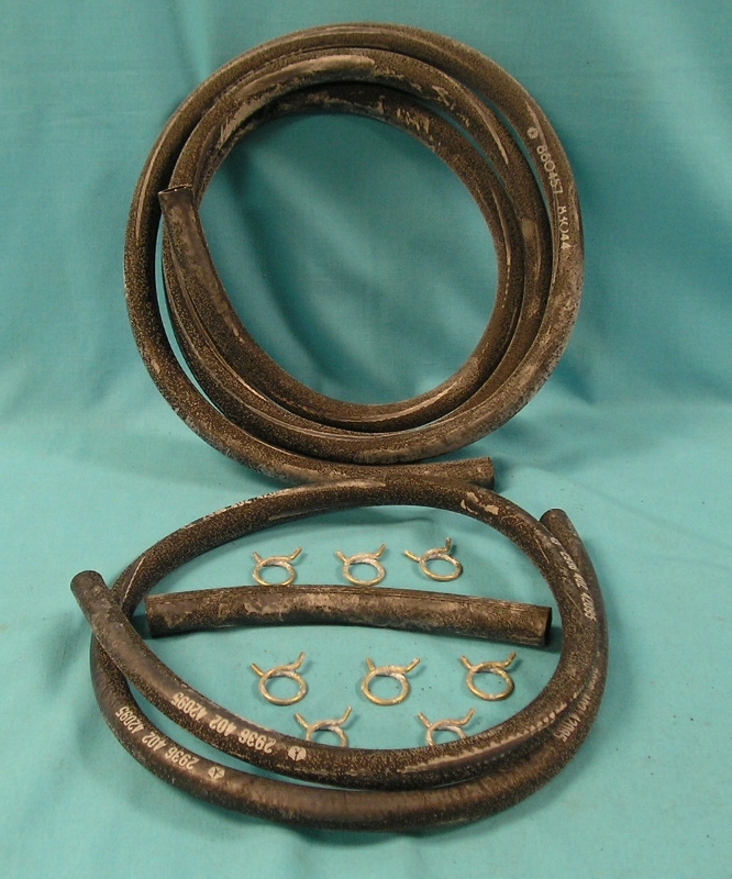 Heater Hose Set -(with A/C). Includes one 5-ft/ 1/2" hose with part number 2936398 and one 5-ft. 5/8" hoses with part number 1605534. Each hose is ribbed, and features a pentastar and the vendor code 90142A.  Reproduction