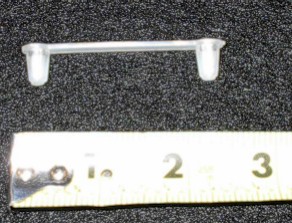 Clear plastic strap-plugs into 2 holes.  Holds wiring & hoses.  Early A & B-body similar to #EQ-JHC but flat across the top of the strap.