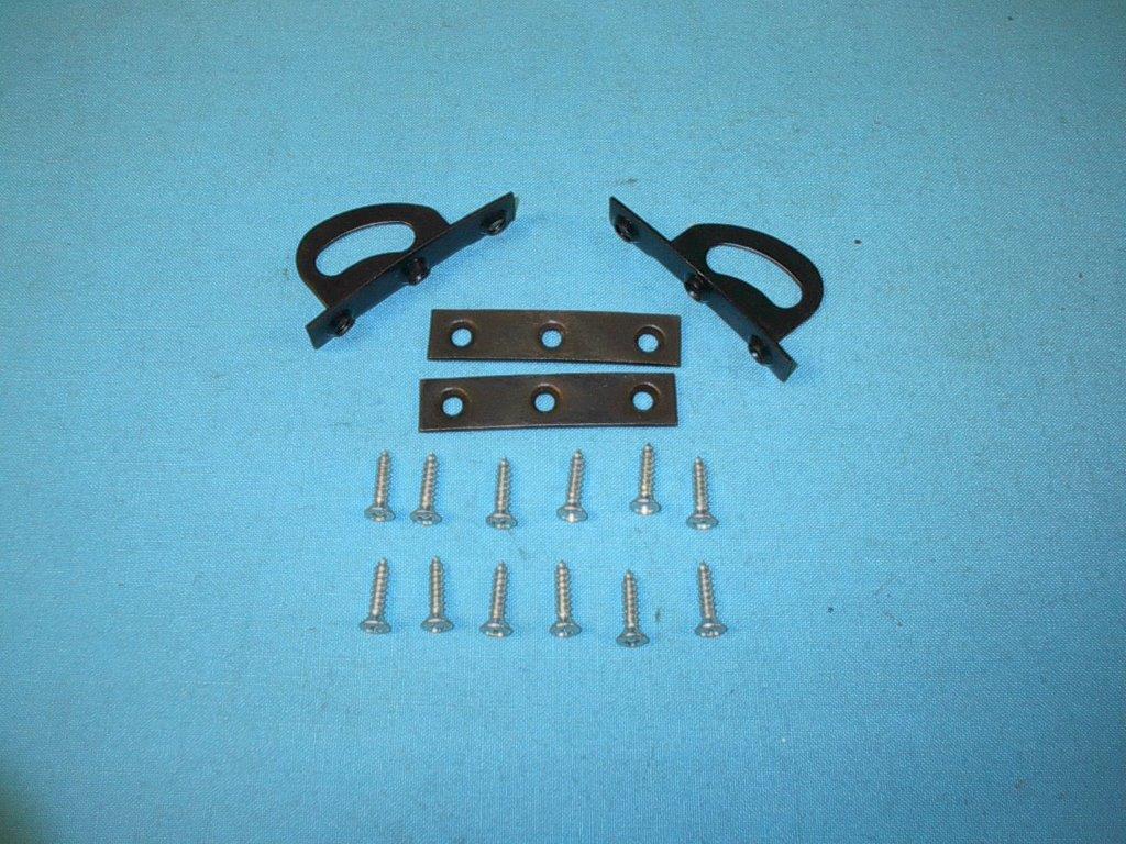 Rear spoiler wing to stanchion attachment brackets. Contains the mounting brackets & attaching screws. Reproductions