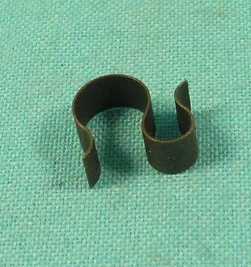 3/8" and 1/4" double line clip.  This S-shaped clip can be used to hold 3/8" fuel line to 1/4" return line.  Black steel. Aftermarket
